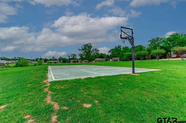 a view of a park with welcome board
