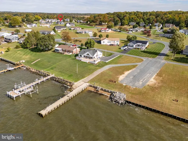a view of a swimming pool and an outdoor seating