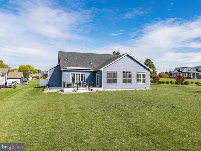 a view of house with outdoor space and sitting space