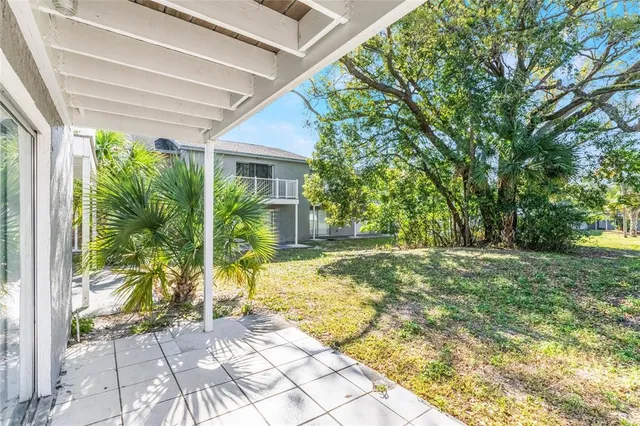 a view of a backyard with garden
