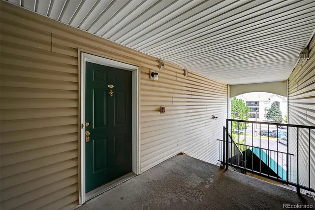 a view of a porch with a door