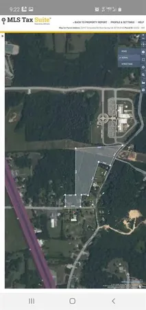 a view of a golf course with a lake