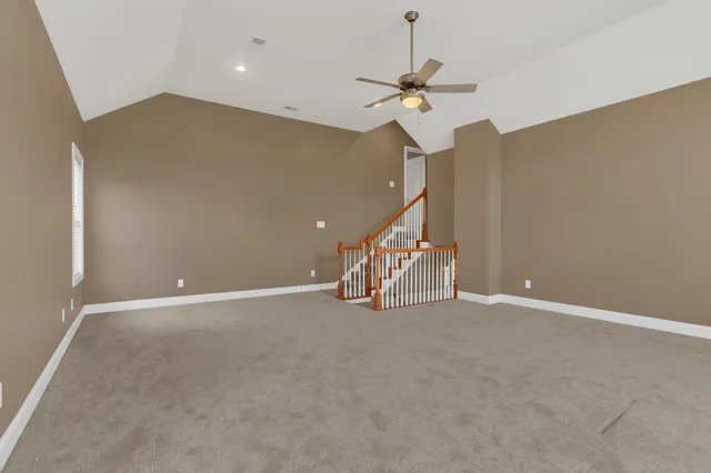 a view of a hallway with windows