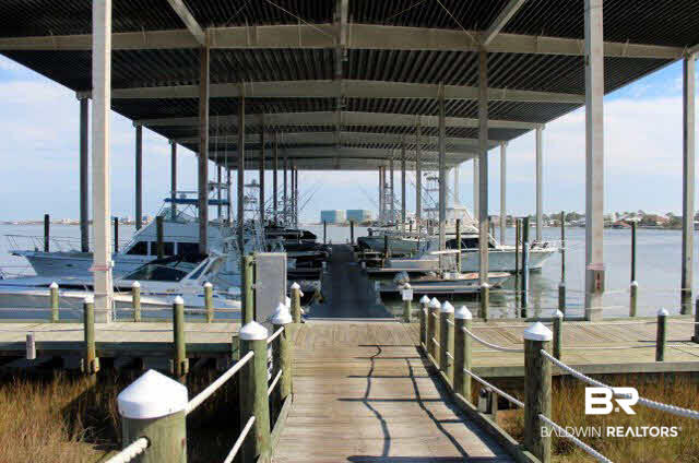 4563 Grander Court, Unit 4563 Orange Beach, AL 36561 - Photo 5 of 22 Own the 1st slip on the right #2, now has a finger pier Boat Lift and enough room for you 2nd larger boat.