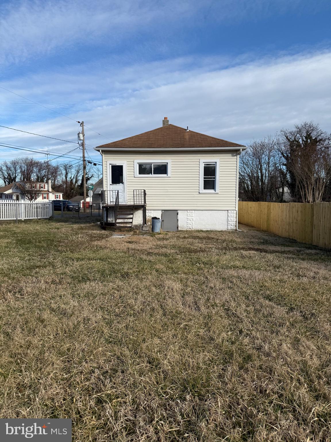 239 Midland Brooklyn, MD 21225 - Photo 12 of 13 a view of a house with a yard