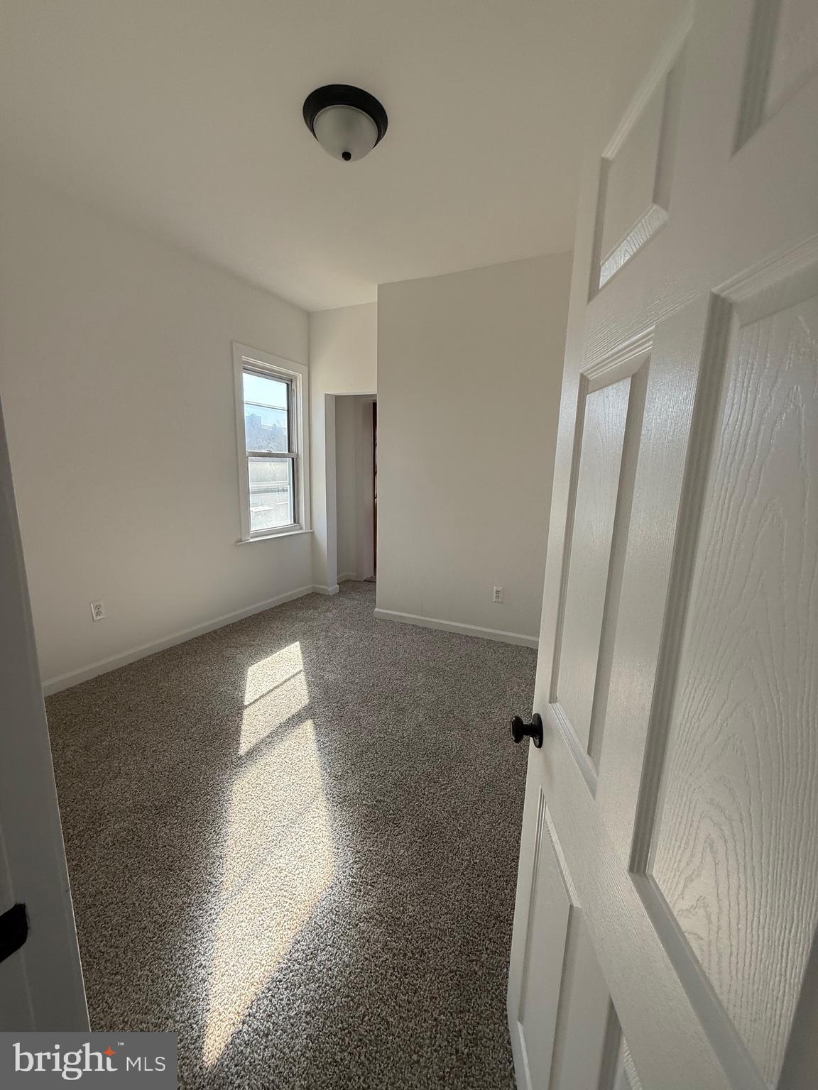 239 Midland Brooklyn, MD 21225 - Photo 8 of 13 a view of entryway with window