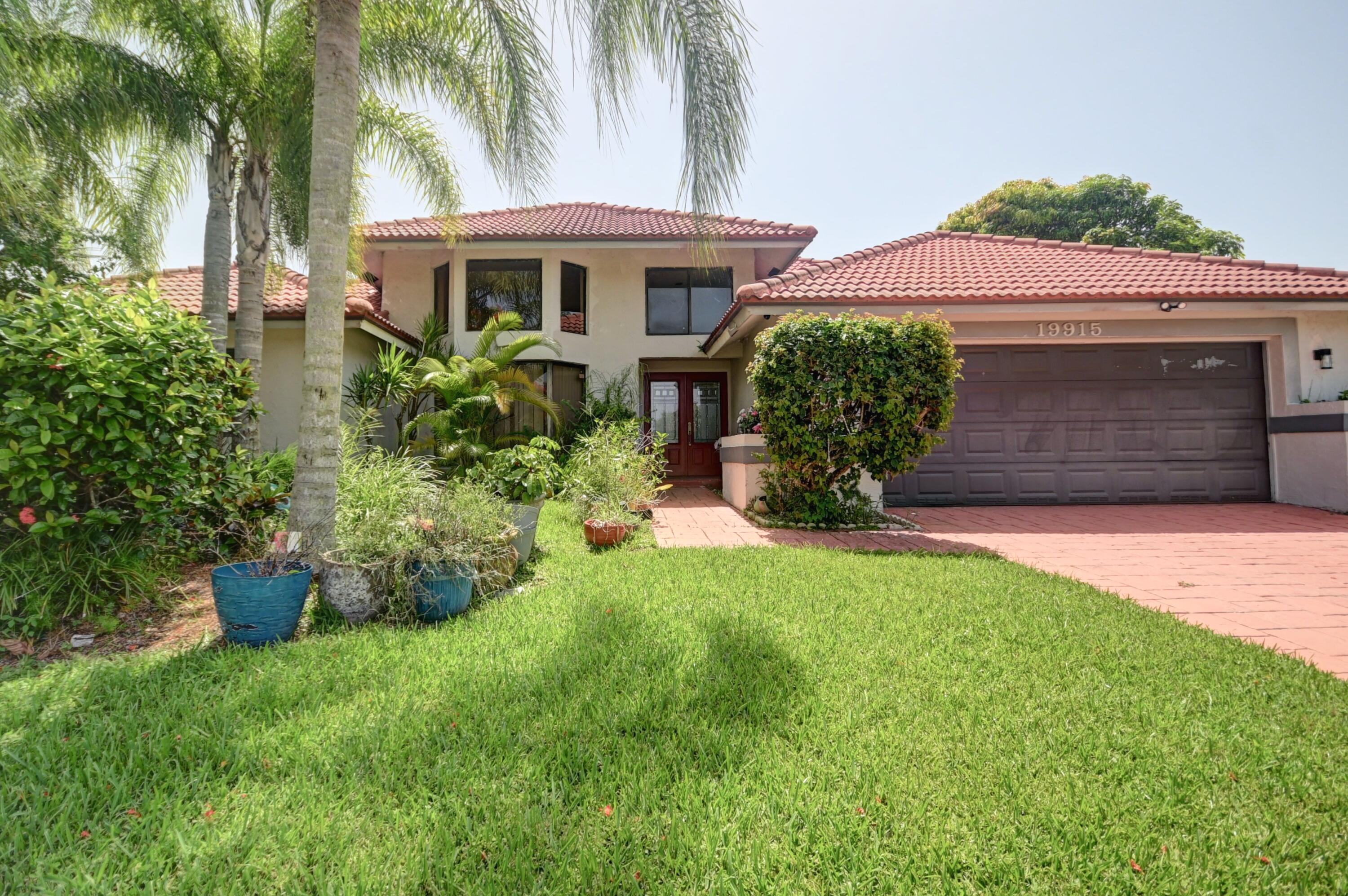 19915 Back 9 Drive Boca Raton, FL 33498 - Photo 1 of 11 front