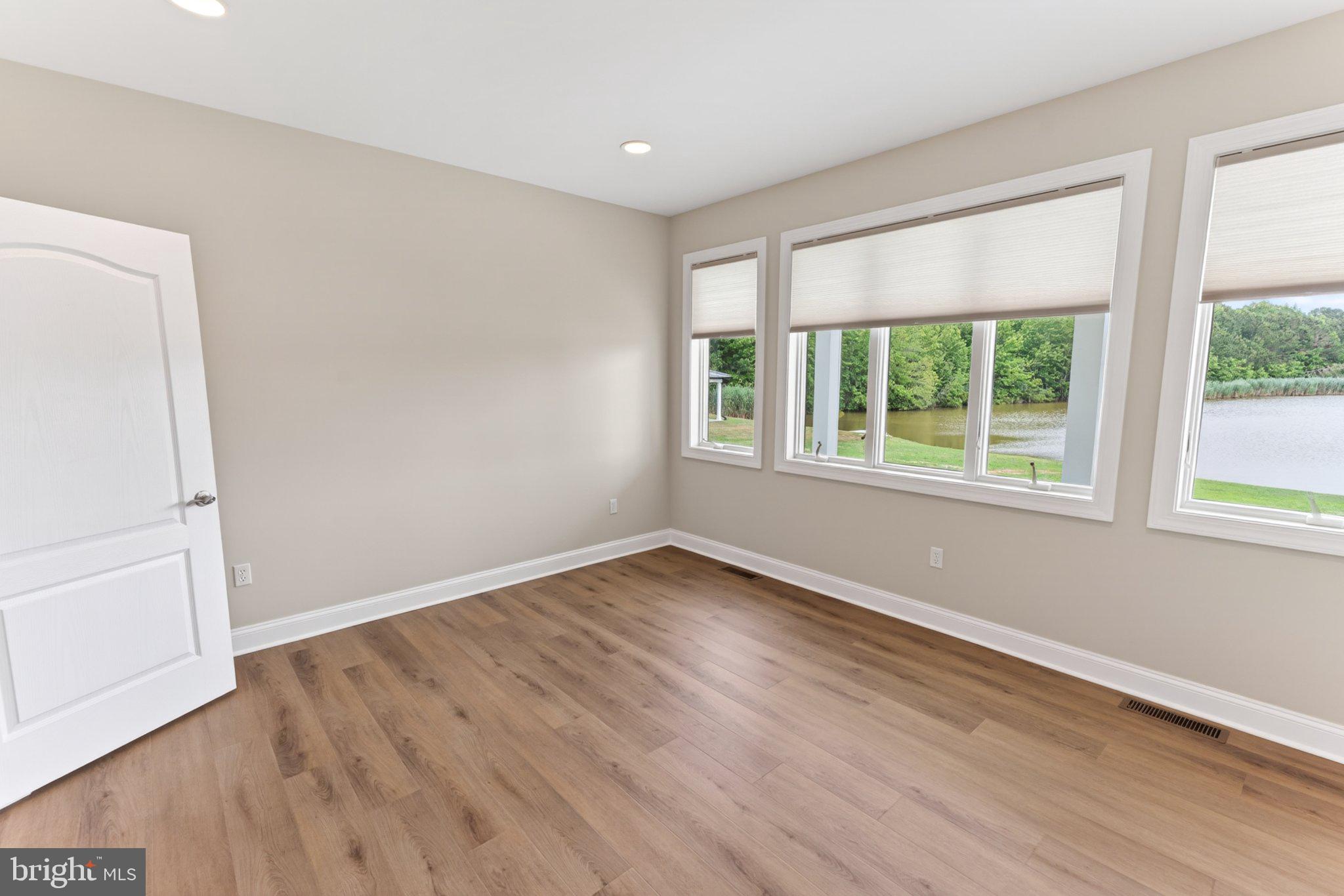 34029 Peppers Corner Road Millville, DE 19967 - Photo 23 of 101 Bright, airy room with scenic views.