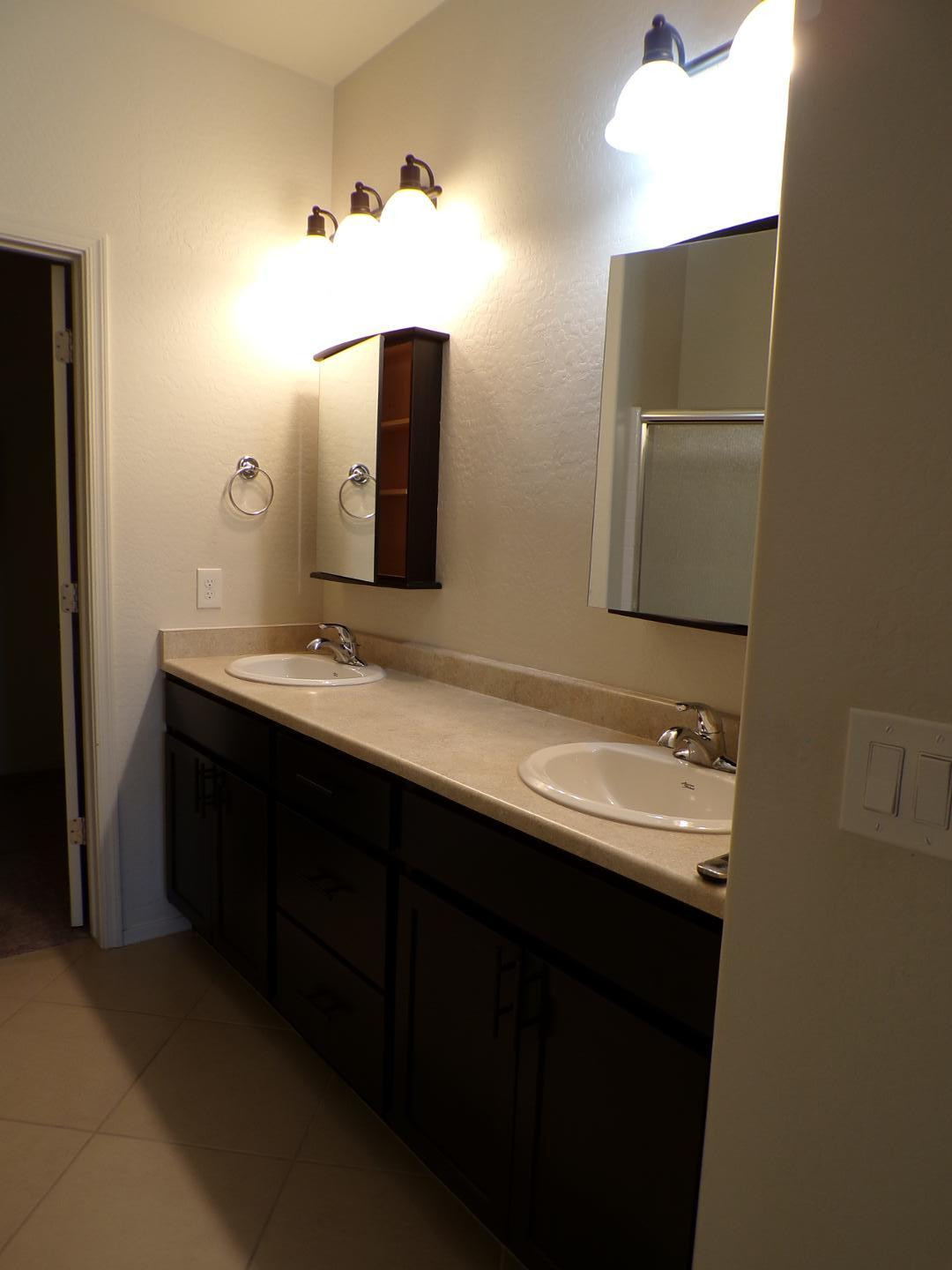 844 Tiablanca Road Clarkdale, AZ 86324 - Photo 9 of 12 a bathroom with a sink and a mirror
