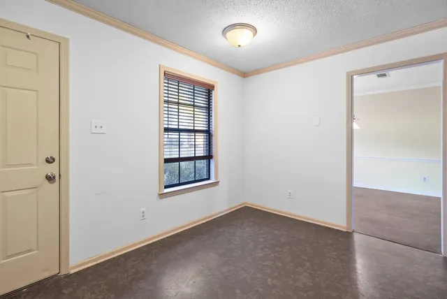 an empty room with a window