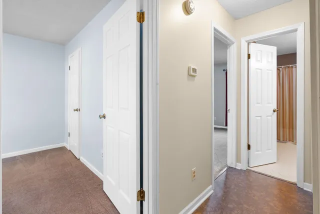a view of a hallway with closet