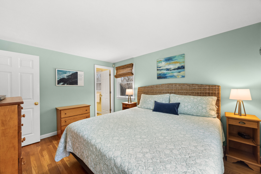 68 20th Street South Edgartown, MA 02539 - Photo 11 of 26 a bedroom with a bed and wooden floor