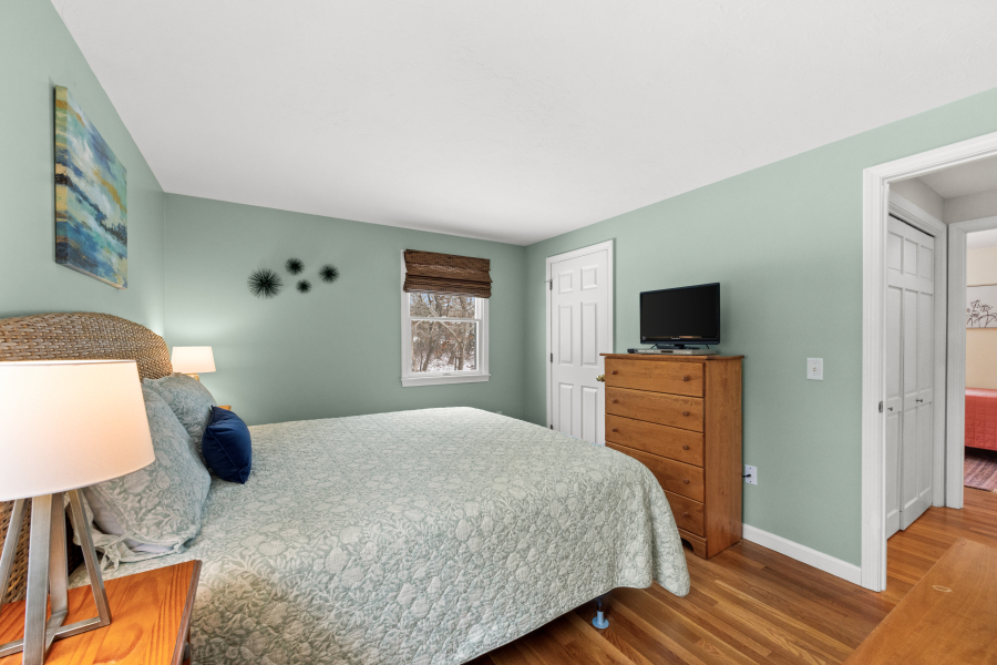 68 20th Street South Edgartown, MA 02539 - Photo 12 of 26 a bedroom with a bed and a flat screen tv
