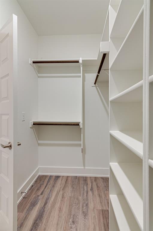 115 West Jones Street, Unit 201 Krum, TX 76249 - Photo 15 of 15 a view of an empty walk in closet