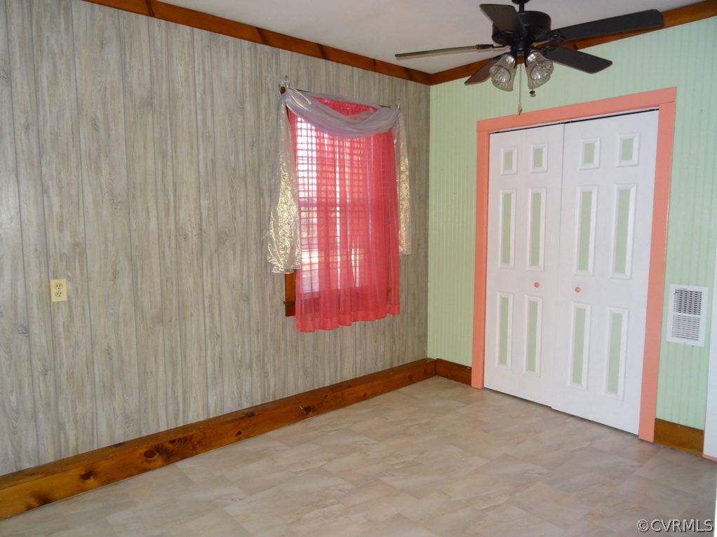19225 Templeton Road Carson, VA 23830 - Photo 16 of 21 a view of a livingroom with a staircase