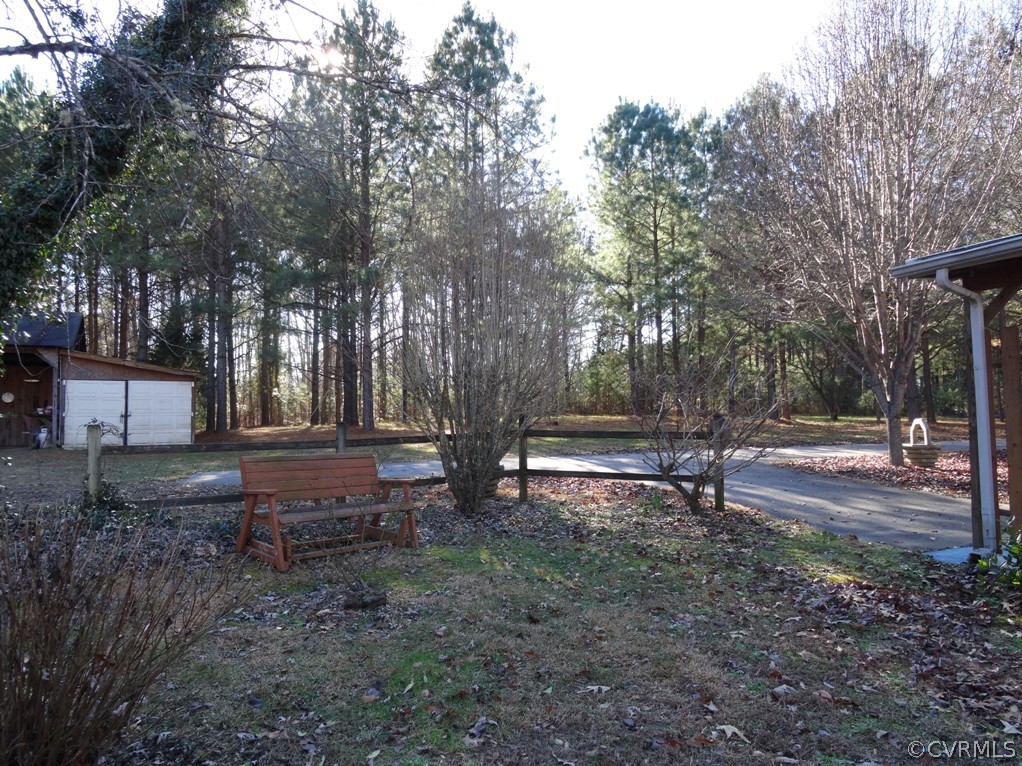 19225 Templeton Road Carson, VA 23830 - Photo 3 of 21 a backyard of a house with lots of green space