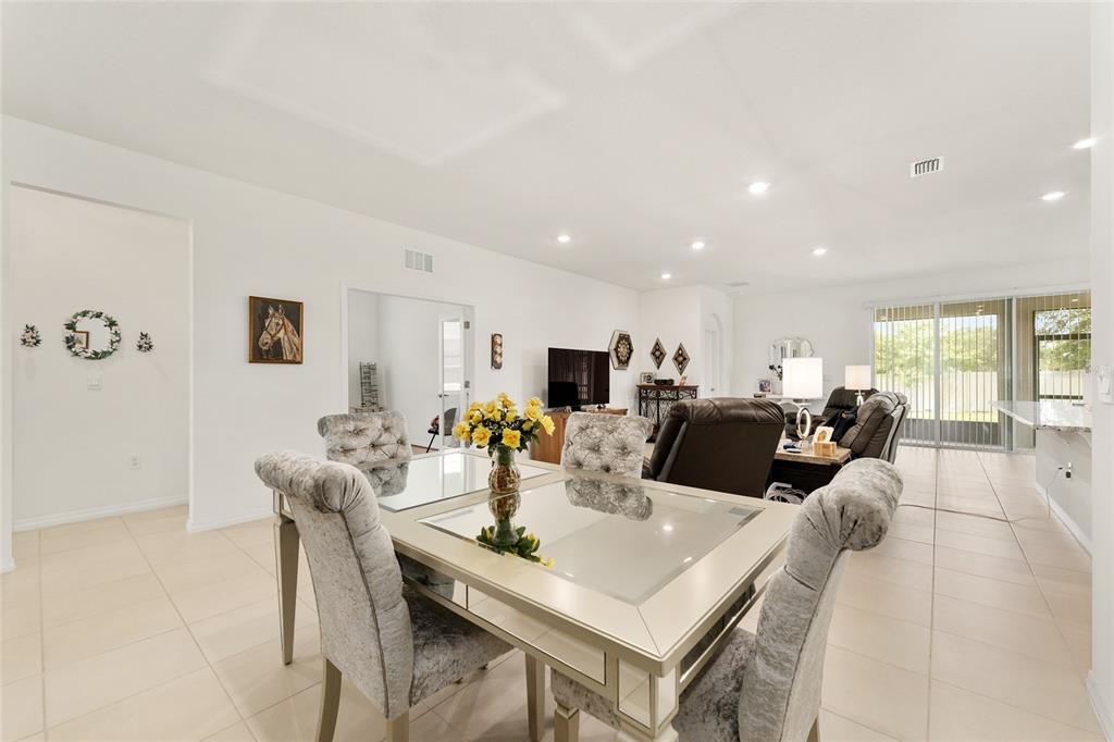 6175 Southwest 88th Loop Ocala, FL 34476 - Photo 9 of 56 a view of a dining room with furniture