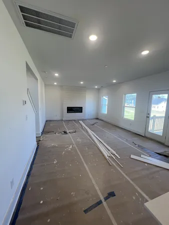 a view of a hallway with stairs