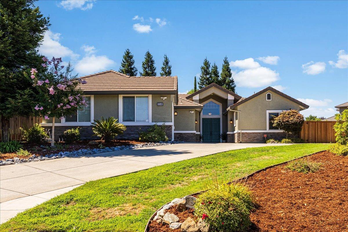 3548 Lambeth Drive Rescue, CA 95672 - Photo 1 of 1 a front view of a house with a yard and garage