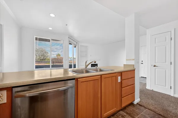 a white refrigerator freezer sitting in a kitchen