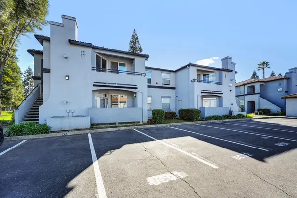 a front view of a house with yard