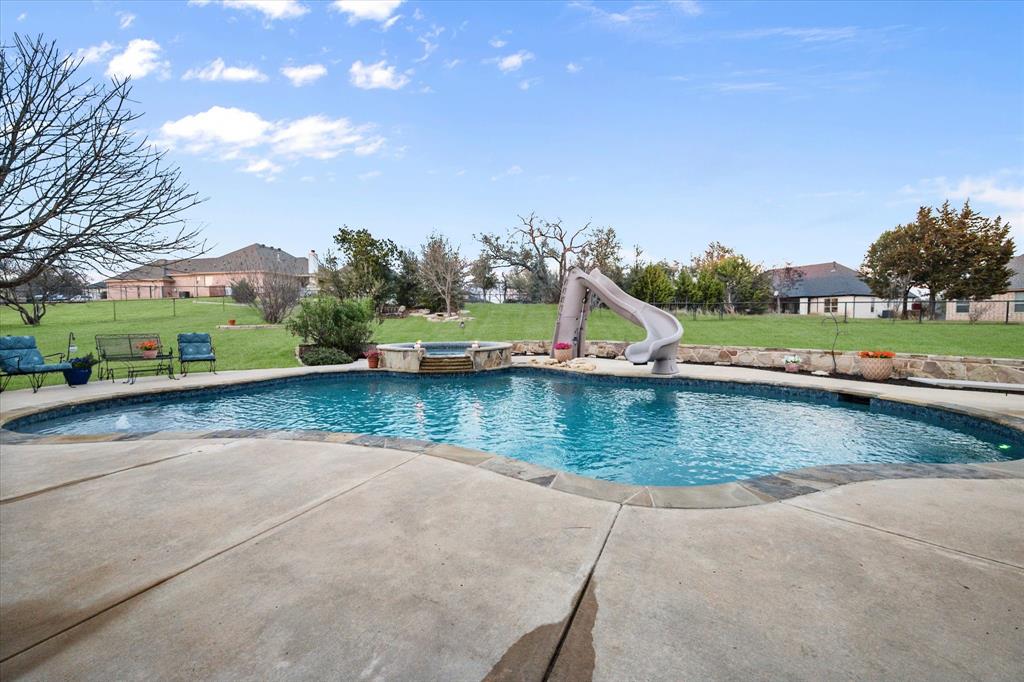 3715 Lonesome Creek Road Granbury, TX 76049 - Photo 11 of 40 a view of a lake with houses