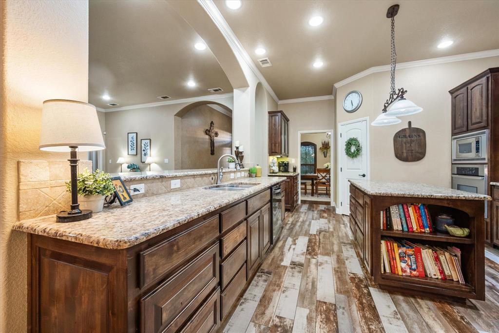3715 Lonesome Creek Road Granbury, TX 76049 - Photo 19 of 40 a kitchen with lots of counter space and refrigerator