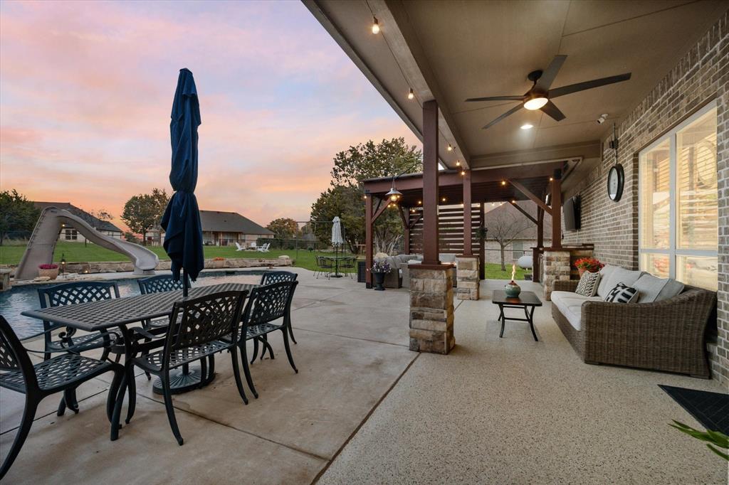 3715 Lonesome Creek Road Granbury, TX 76049 - Photo 35 of 40 a outdoor space with lots of chairs and a couch
