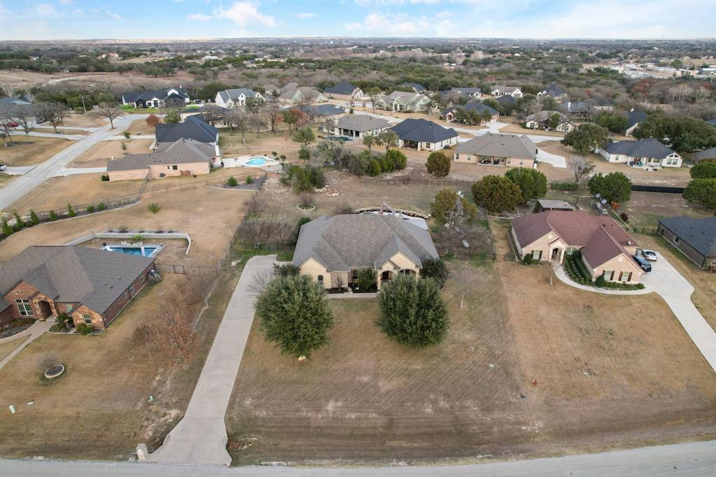 3715 Lonesome Creek Road Granbury, TX 76049 - Photo 36 of 40 an aerial view of a house with a yard