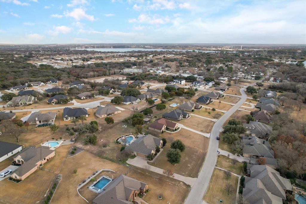 3715 Lonesome Creek Road Granbury, TX 76049 - Photo 37 of 40 an aerial view of residential building with parking space