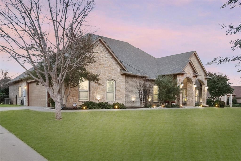 3715 Lonesome Creek Road Granbury, TX 76049 - Photo 10 of 40 a front view of a house with a yard