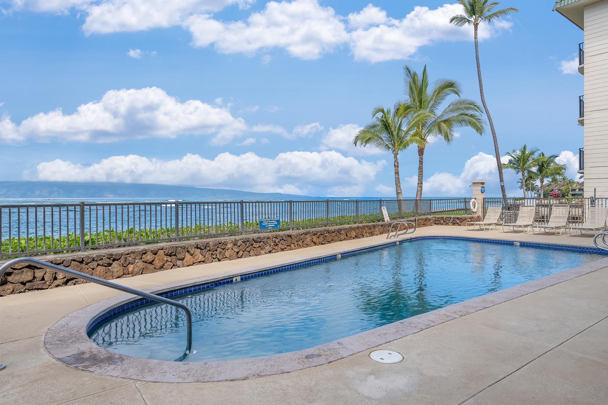 4471 Lower Honoapiilani Road, Unit 203 Lahaina, HI 96761 - Photo 30 of 40 a view of outdoor space and swimming pool