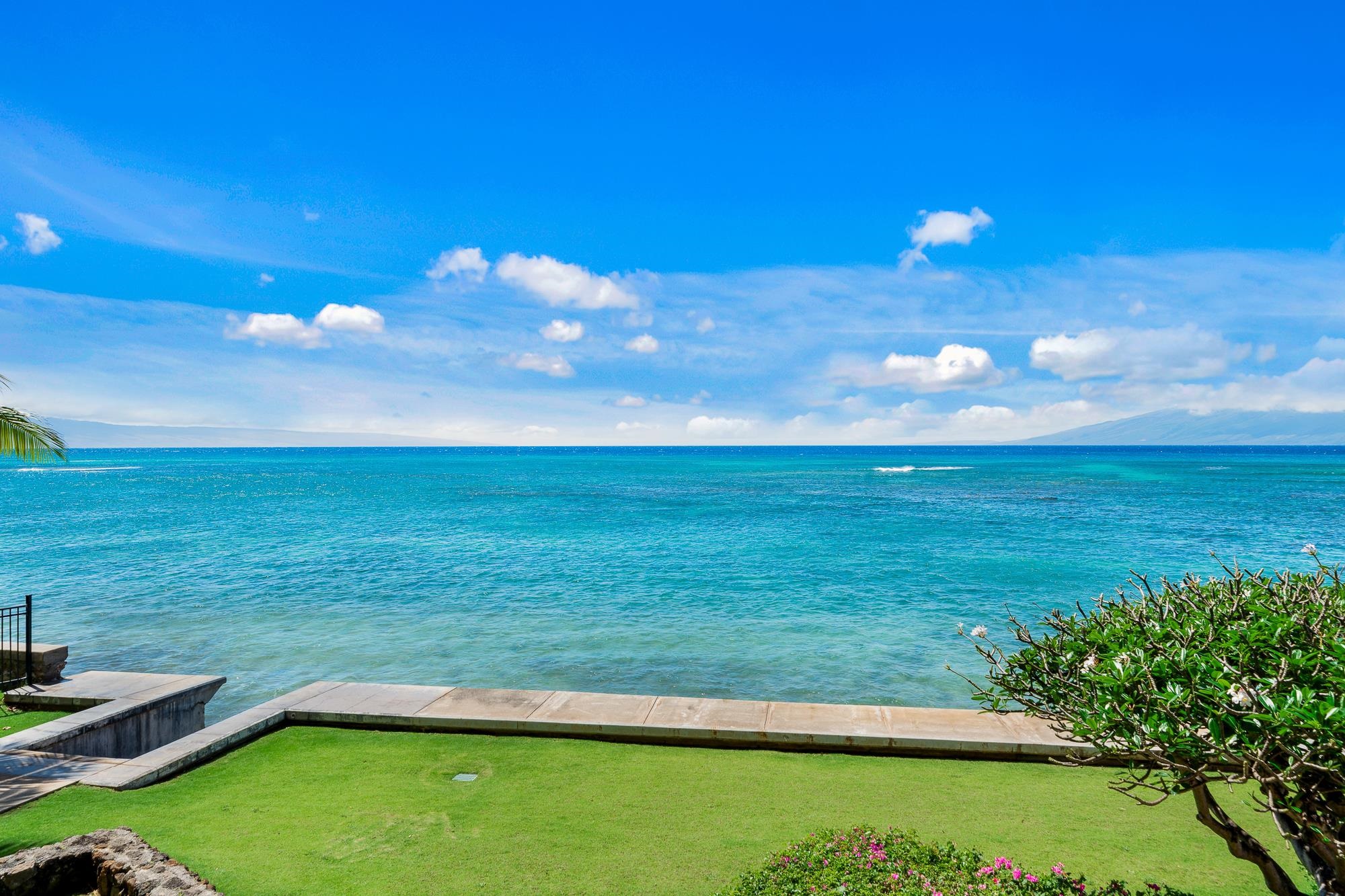 4471 Lower Honoapiilani Road, Unit 203 Lahaina, HI 96761 - Photo 35 of 40 a view of a lake with a big yard