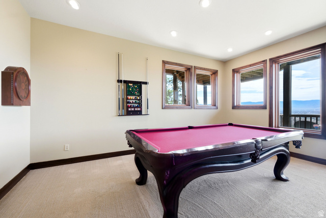 335 Bern Way Midway, UT 84049 - Photo 43 of 88 Recreation room featuring an ornate billiards table, recessed lighting, and multiple windows with dark wood trim