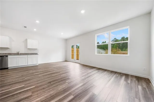 a view of an empty room and window