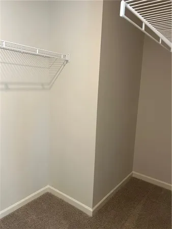 a view of small space with racks on the wall