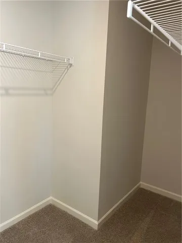 a view of small space with racks on the wall