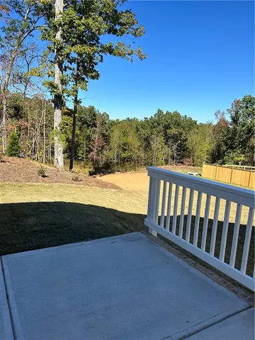 a view of a balcony with an ocean view