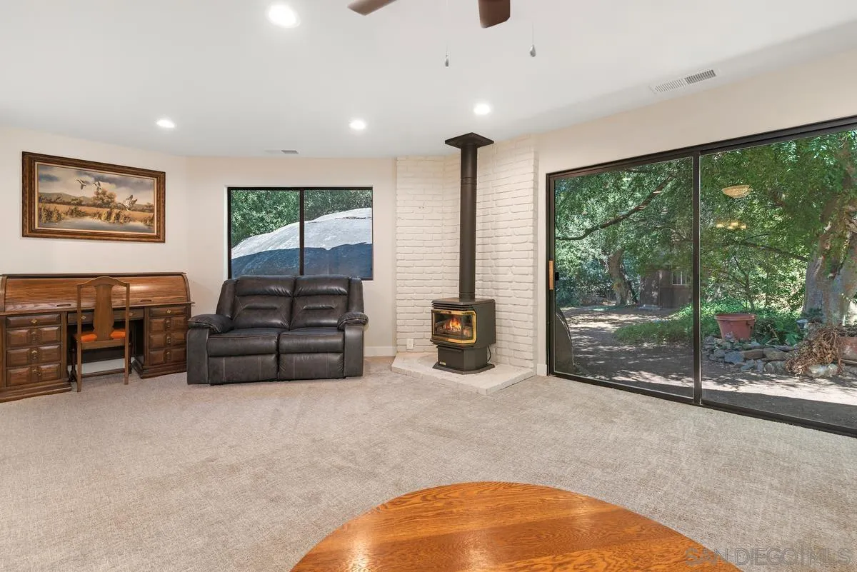 17230 Highway 67 Ramona, CA 92065 - Photo 17 of 37 a room with furniture and large windows