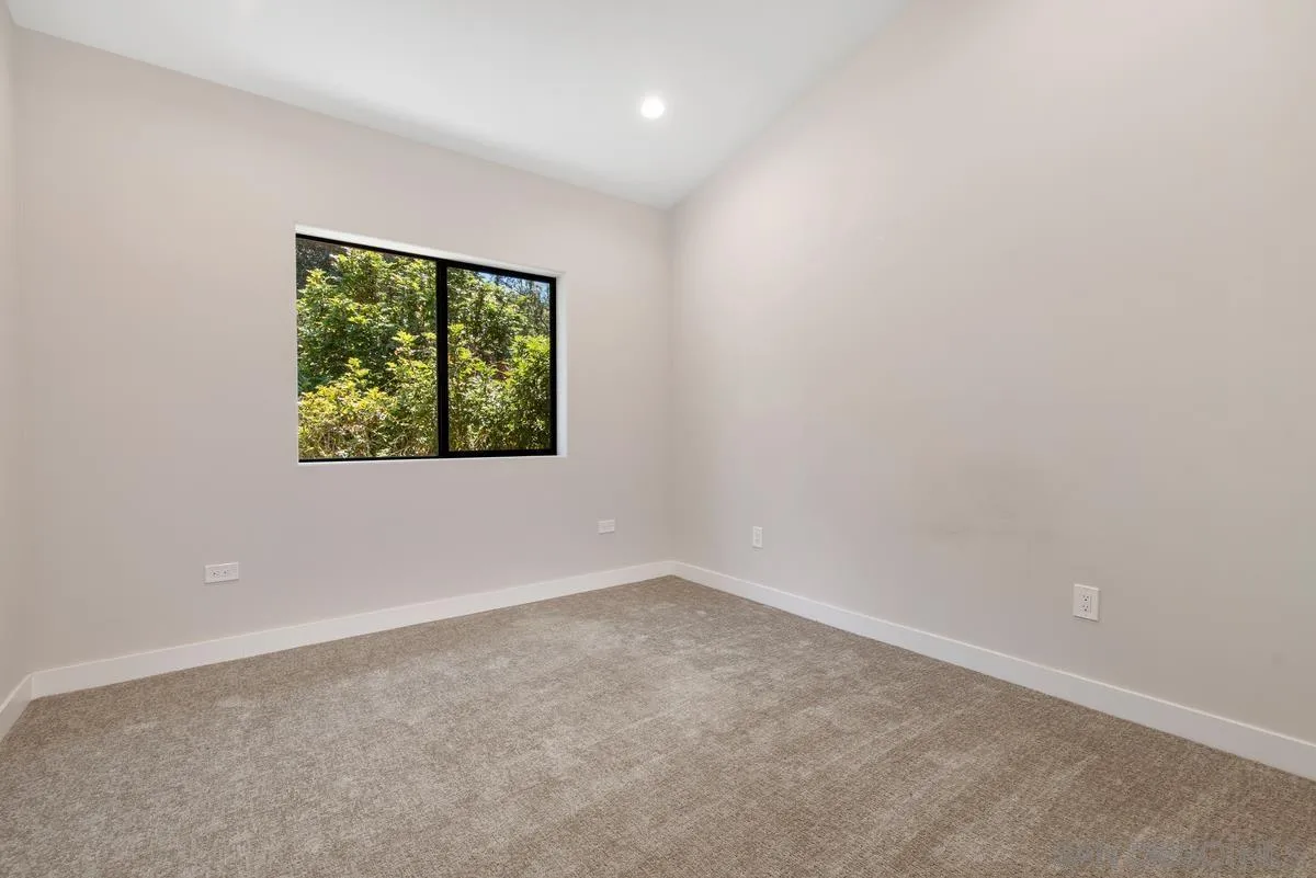 17230 Highway 67 Ramona, CA 92065 - Photo 24 of 37 an empty room with windows