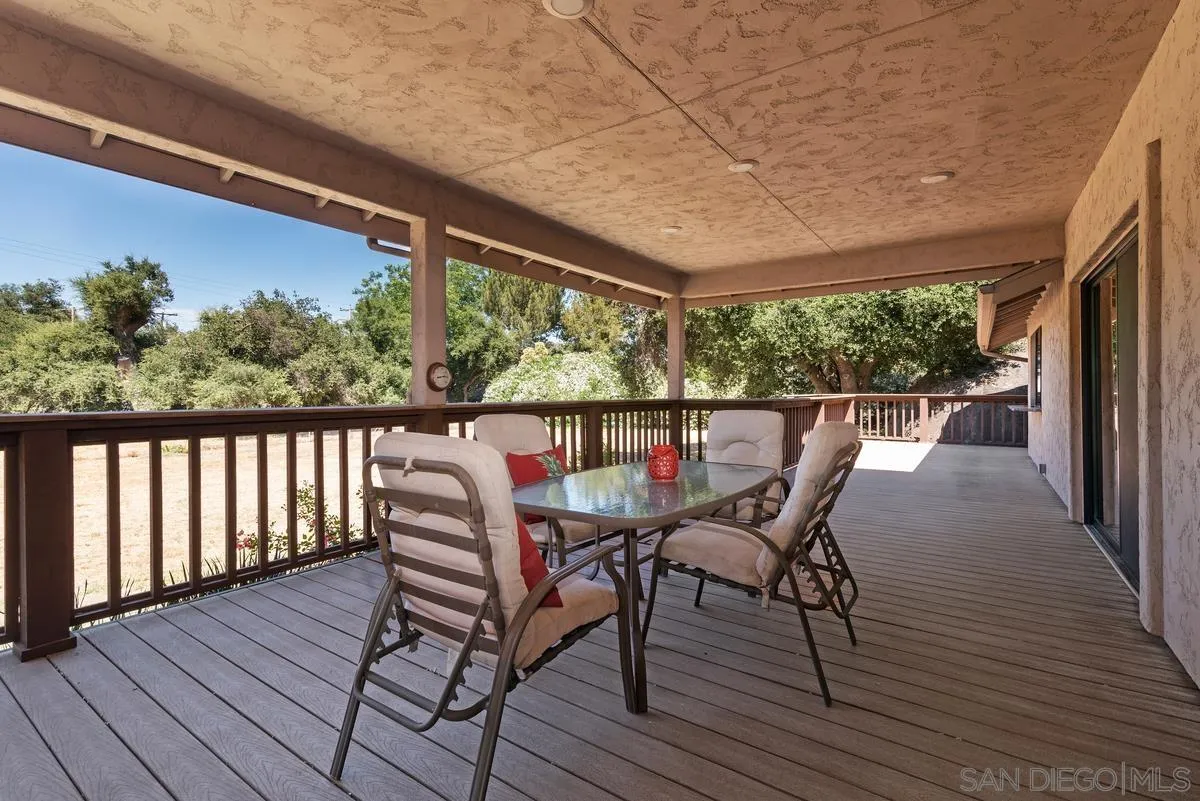 17230 Highway 67 Ramona, CA 92065 - Photo 27 of 37 a view of a chairs on wooden deck