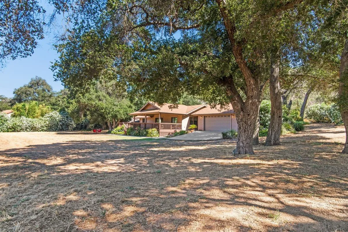 17230 Highway 67 Ramona, CA 92065 - Photo 37 of 37 a front view of a house with a yard