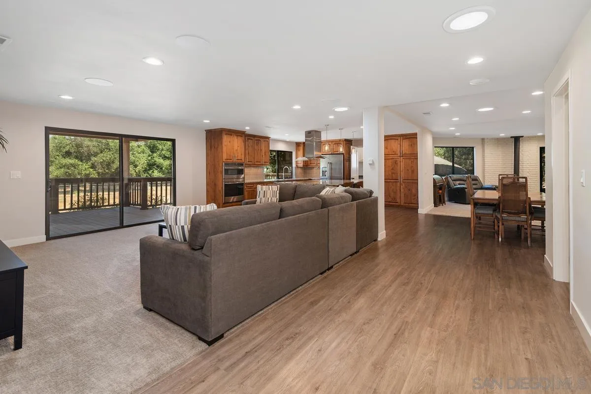 17230 Highway 67 Ramona, CA 92065 - Photo 4 of 37 a living room with furniture and a flat screen tv