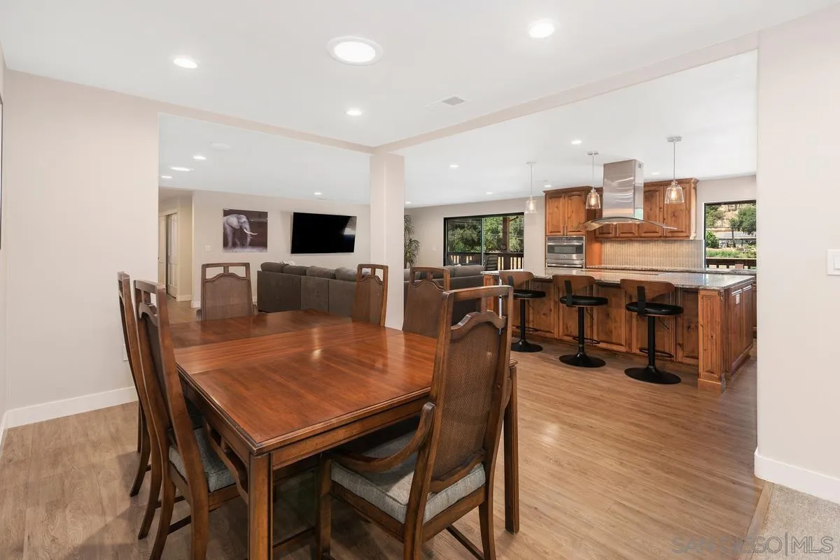 17230 Highway 67 Ramona, CA 92065 - Photo 8 of 37 a view of a dining room with furniture and wooden floor