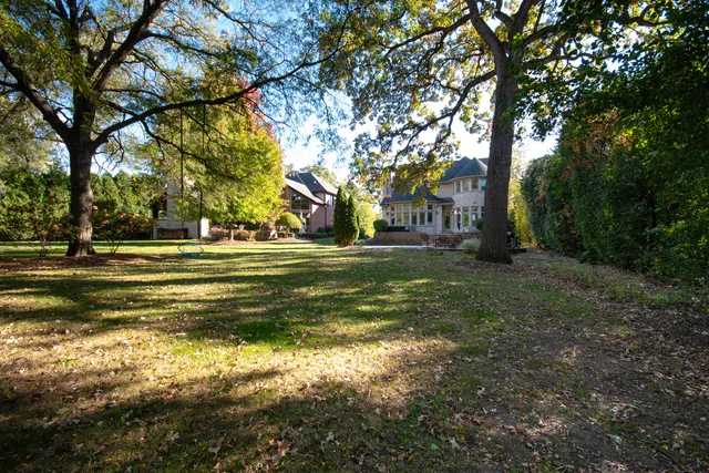 a view of a golf course with a big yard