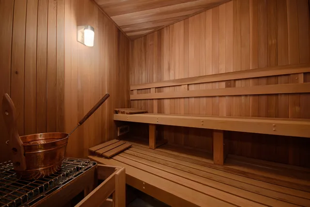 a kitchen with wooden cabinets and a stove
