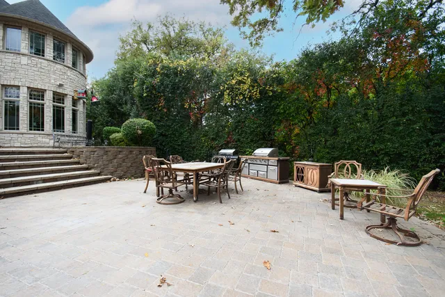 a view of a chairs and tables in the patio
