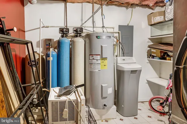 a view of a backyard with a tree