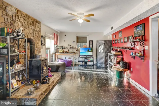 a view of a playground with basketball court