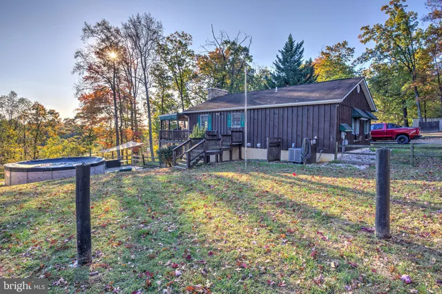 a view of a playground with basketball court